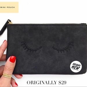 Stella & Dot mini pouch with embroidered l…